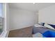 Bedroom with a bed near a window and a container; a clean and simple space at 6903 Aster Dr, Pendleton, IN 46064