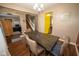 Formal dining room with access to the kitchen, living room, and stairs at 6913 Thousand Oaks Ln, Indianapolis, IN 46214
