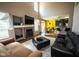 Bright open-plan living space flows into a kitchen with bar seating and dining area at 6913 Thousand Oaks Ln, Indianapolis, IN 46214