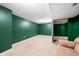 A functional basement area includes space for a sofa and other furnishings, perfect for storage or play at 7023 Hartington Pl, Indianapolis, IN 46259
