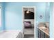 Bathroom with views to an ensuite bedroom featuring a large soaking tub at 7023 Hartington Pl, Indianapolis, IN 46259