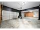 Spacious garage with multiple car capacity and ample storage space at 7023 Hartington Pl, Indianapolis, IN 46259