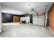 A spacious garage offers ample room for storage, equipped with multiple doors at 7023 Hartington Pl, Indianapolis, IN 46259