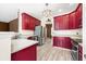 Stylish kitchen with stainless steel appliances and warm wood cabinets at 7023 Hartington Pl, Indianapolis, IN 46259
