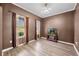 Comfortable room with wood floors, a fish tank, and a relaxing ambiance at 7023 Hartington Pl, Indianapolis, IN 46259