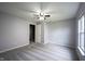 Spacious bedroom featuring soft gray carpet and a ceiling fan at 7131 Blue Ridge Dr, Noblesville, IN 46062