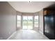 Cozy breakfast nook with sliding glass doors leading to the backyard at 7131 Blue Ridge Dr, Noblesville, IN 46062
