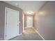 Inviting entryway featuring neutral paint and flooring and a bright front door at 7131 Blue Ridge Dr, Noblesville, IN 46062