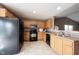 Updated kitchen featuring stainless steel appliances, ample cabinet space, and modern finishes at 7131 Blue Ridge Dr, Noblesville, IN 46062