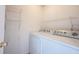 Laundry room equipped with a washer, dryer and wire shelving at 7131 Blue Ridge Dr, Noblesville, IN 46062