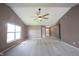 Spacious living room with vaulted ceiling, neutral paint, carpeting and a view of the front entryway at 7131 Blue Ridge Dr, Noblesville, IN 46062