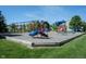 Community playground featuring swings, slides, and climbing structures at 7131 Blue Ridge Dr, Noblesville, IN 46062