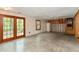 Spacious unfinished basement with a walkout to the backyard, offering potential for customization at 7189 Creekwood Estates, Brownsburg, IN 46112