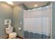 Bathroom featuring a shower with a white shower curtain, and neutral paint color at 7189 Creekwood Estates, Brownsburg, IN 46112