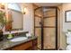 Bathroom featuring a tiled shower and granite vanity at 7189 Creekwood Estates, Brownsburg, IN 46112
