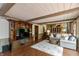 Inviting living room with custom built-ins, hardwood floors, and a cozy seating area at 7189 Creekwood Estates, Brownsburg, IN 46112