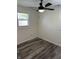 This bedroom features hardwood floors and natural light, making it the perfect space to unwind at 7334 Westchester Dr, Indianapolis, IN 46226