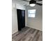 This bedroom has a closet and hardwood floors at 7334 Westchester Dr, Indianapolis, IN 46226