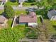 Backyard view, showing the home's layout with fenced yard, patio, and firepit at 7645 Madden Dr, Fishers, IN 46038