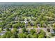 Charming home is nestled in a lush neighborhood, showcasing its curb appeal and surroundings at 7645 Madden Dr, Fishers, IN 46038