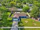 Aerial view of a cozy single-story home with a fenced backyard and driveway at 7645 Madden Dr, Fishers, IN 46038