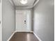Welcoming foyer with a clean design, modern lighting, and sleek flooring at 7645 Madden Dr, Fishers, IN 46038
