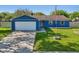 Charming single-story home with a well-manicured lawn and an attached two-car garage at 7645 Madden Dr, Fishers, IN 46038