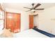 Bedroom with a ceiling fan and closet at 7849 E 49Th St, Indianapolis, IN 46226
