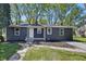 Charming single-story home with gray siding, white trim, and a well-maintained front lawn, offering great curb appeal at 807 Vasbinder Dr, Chesterfield, IN 46017