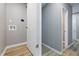 Hallway featuring neutral walls and modern flooring at 807 Vasbinder Dr, Chesterfield, IN 46017