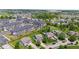 Wide aerial view of homes, apartments, pools, and green spaces in a residential community at 8178 Eskerban Dr, Avon, IN 46123