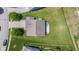 Aerial view showing the backyard with a patio, lush lawn, and mature trees at 8178 Eskerban Dr, Avon, IN 46123
