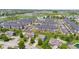Aerial view showcasing houses, apartments, landscaping, and surrounding community features at 8178 Eskerban Dr, Avon, IN 46123