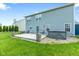 Large backyard featuring a lush green lawn and spacious patio perfect for outdoor entertaining at 8178 Eskerban Dr, Avon, IN 46123