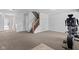 Large basement with neutral carpet and access to the stairs at 8178 Eskerban Dr, Avon, IN 46123