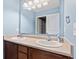 Bathroom features a double sink vanity with wood cabinets and modern fixtures at 8178 Eskerban Dr, Avon, IN 46123