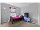 This bedroom boasts neutral walls, carpeted floors, and ample natural light through a window at 8178 Eskerban Dr, Avon, IN 46123
