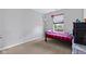 Bedroom with a small window, and a bed with black frame and red plaid blanket at 8178 Eskerban Dr, Avon, IN 46123
