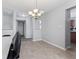 Bright dining room with chandelier and open access to other rooms at 8178 Eskerban Dr, Avon, IN 46123