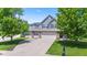 Beautiful home exterior with a spacious driveway, two-car garage, and well-maintained landscaping at 8178 Eskerban Dr, Avon, IN 46123