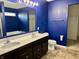 A bathroom featuring a double sink vanity and tile flooring at 837 Sommersweet Run, Greenwood, IN 46143