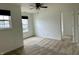 A carpeted bedroom featuring windows and white walls at 837 Sommersweet Run, Greenwood, IN 46143