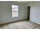 A vacant bedroom with neutral walls and carpet at 837 Sommersweet Run, Greenwood, IN 46143