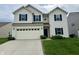 Charming two-story home featuring a spacious two-car garage and well-maintained lawn at 837 Sommersweet Run, Greenwood, IN 46143