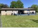 A brick home with a large back deck, ideal for outdoor entertaining and relaxation at , Martinsville, IN 46151