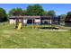 Backyard with a playground and trampoline at , Martinsville, IN 46151