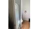 Bathroom with a white shower and a light colored floor at , Martinsville, IN 46151