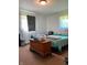 Bedroom featuring a cozy bed, dresser, and plenty of natural light from the window at , Martinsville, IN 46151