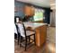 Modern kitchen with quartz countertops, stainless steel refrigerator and eat in island at , Martinsville, IN 46151