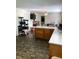 Kitchen with quartz countertops and stainless steel appliances, adjacent to a dining area at , Martinsville, IN 46151